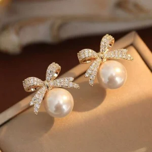 Brincos com laço de strass  & design de pérola - Dourado